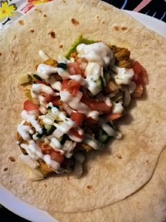 Una foto de Fajitas de pollo o pescado vegetales
