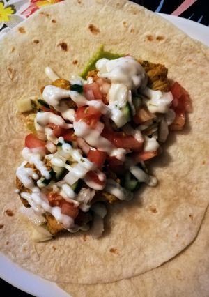 Una foto de Fajitas de pollo o pescado vegetales