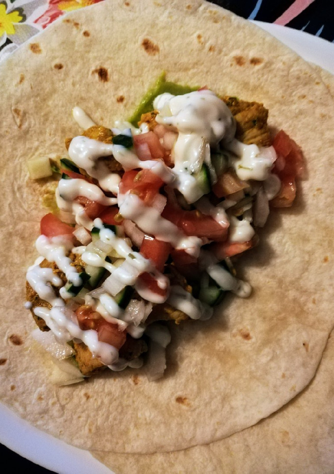 Una foto de Fajitas de pollo o pescado vegetales