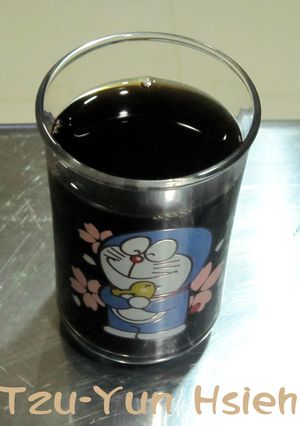 A picture of Grass Jelly Drink (Herbal Tea).