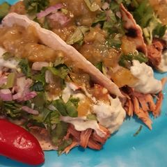 A picture of Shedded pork tacos.