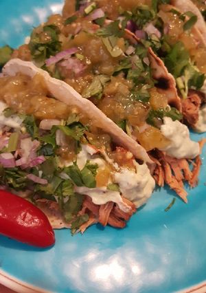A picture of Shedded pork tacos.