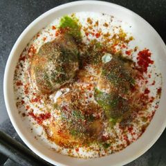 A picture of Dahi vada Curd vada.