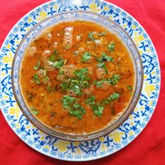 A picture of Gravy Masoor Dal Tadka (Red Lentils).