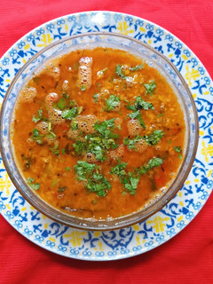 A picture of Gravy Masoor Dal Tadka (Red Lentils).