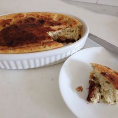 A picture of Goats cheese, Caramelised onion and thyme souffle.