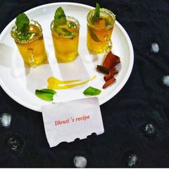 A picture of Honey and mint iced green tea shots.