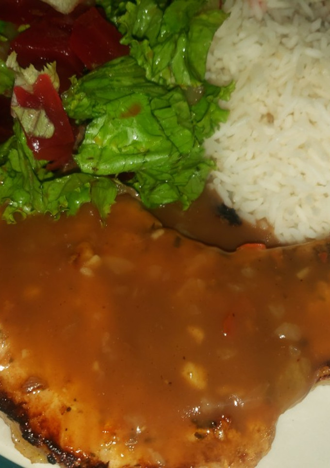 Una foto de Chuleta de Cerdo en salsa de Tamarindo