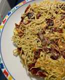 Frittata di Noodles con pesto di pistacchio e pomodori secchi