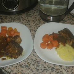 A picture of Chicken pieces & vegetables.