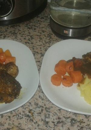 A picture of Chicken pieces & vegetables.