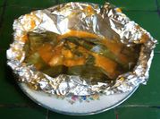Una foto de pescado asado