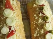 Una foto de pionono salado palmitos