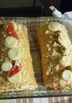 Una foto de Pionono relleno con pollo y palmitos