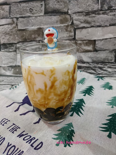 A picture of Tiger Stripe Brown Sugar Milk with Pearls.