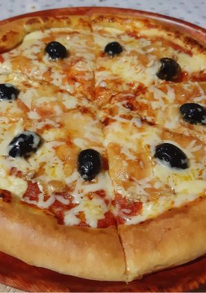 Une photo de Pizza croûte farcie 🍕