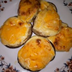 A picture of Cheesy Baked Eggplants.