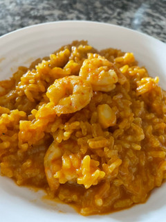 Una foto de Arroz meloso con langostinos y calamares en Mambo