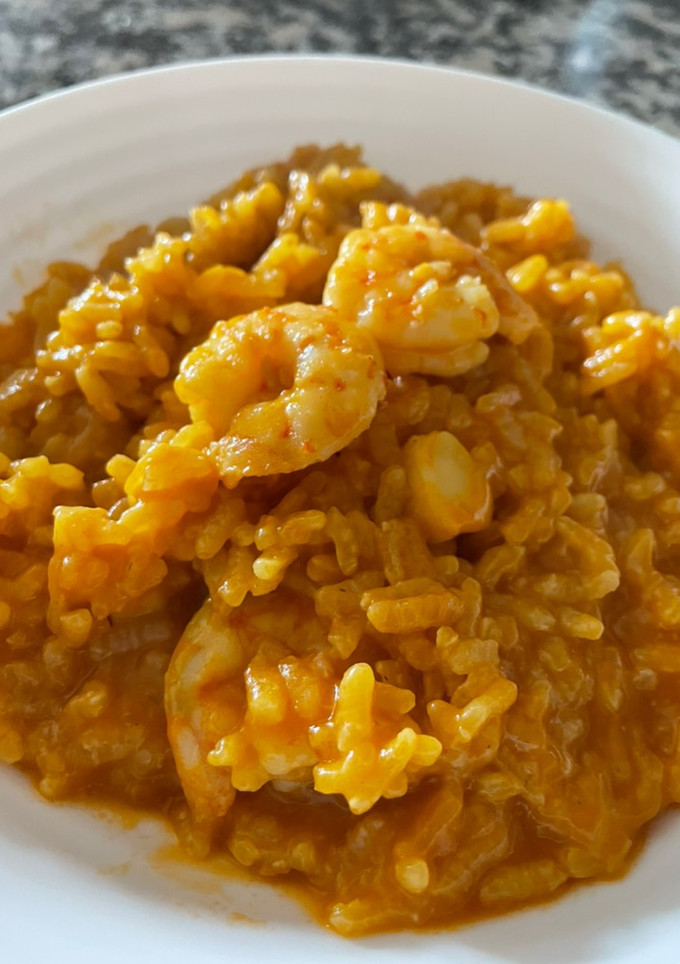 Una foto de Arroz meloso con langostinos y calamares en Mambo