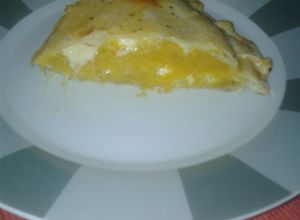 Una foto de Tarta de zapallo, papa y queso con  un toque de miel.