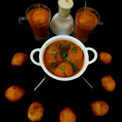 A picture of Kerala Style Rasam Vada.
