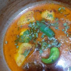 A picture of Alu ghosht.