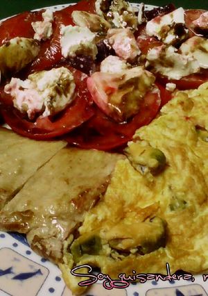 Foto principal de Tortilla de mejillones, secreto de cerdo ibérico y ensalada Caprese