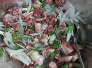 Una foto de ceviche de pulpo