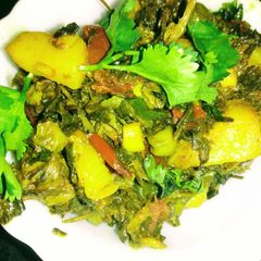 A picture of Methi Peas aloo in garlic and tomato gravy.