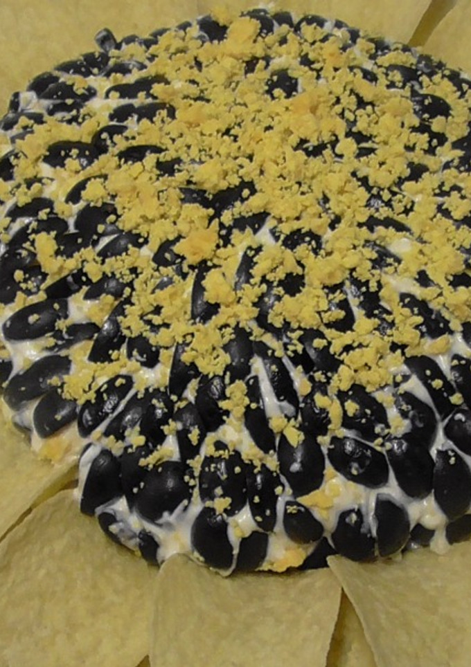 Una foto de Ensalada de Navidad ! receta de Navidad. Flor de girasol!