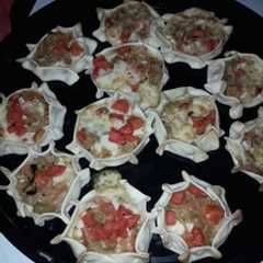 Una foto de Canastitas de muzzarella y cebolla