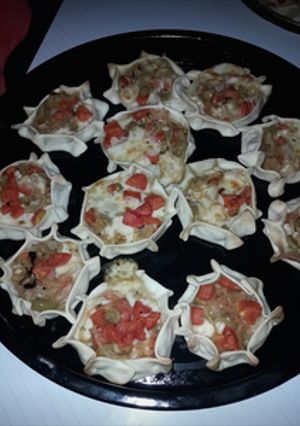 Una foto de Canastitas de muzzarella y cebolla