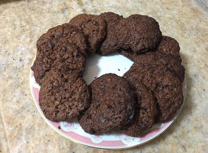 Una foto de Cookies de avena, sabor naranja con azúcar negra, sin manteca y con chips de chocolate