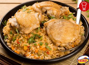 Una foto de Arroz caldoso con contramuslos 🍛