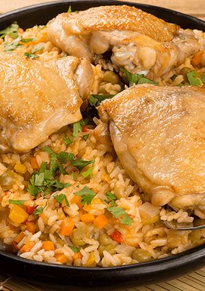 Una foto de Arroz caldoso con contramuslos 🍛