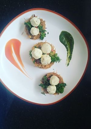 A picture of Cruncy Khichadi Nest With Paneer Balls.