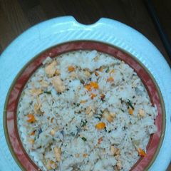 A picture of Fried rice with mango pickle.