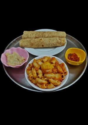 A picture of Macaroni With Potato Curry.
