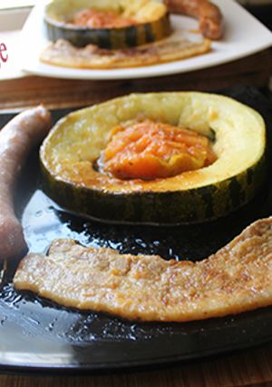 Foto principal de Tocino y longaniza con melón y tomate