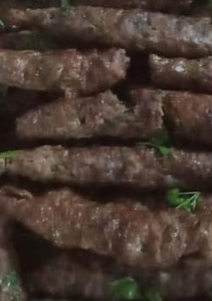 A picture of Grilled Kofta on Charcoal.