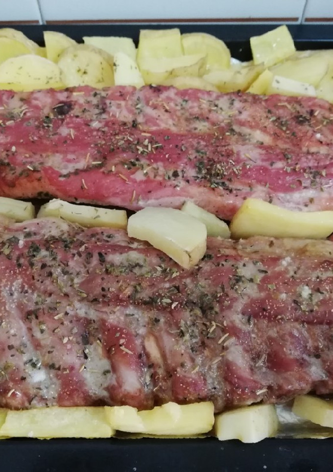 Una foto de Costillar de cerdo a las finas hierbas
