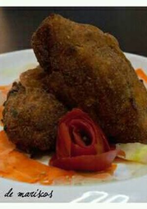 Una foto de Plátano relleno de mariscos