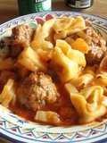 Tortelinis con tuco almondigados