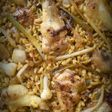 Arroz con pollo de corral y ajos tiernos