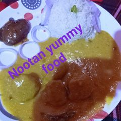 A picture of Curry with rice.