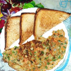 A picture of Egg Omelet with veggies.