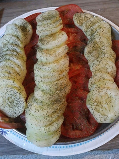 A picture of Cucumbers and Tomatoes with Herbs and Spices.