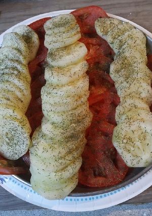 A picture of Cucumbers and Tomatoes with Herbs and Spices.