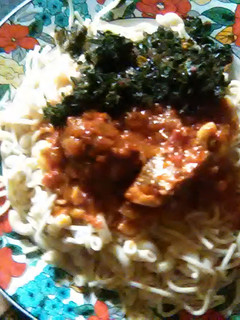 A picture of Spaghetti and macaroni with stew.