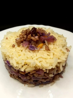 Una foto de Timbal de lombarda con ternera picada y arroz